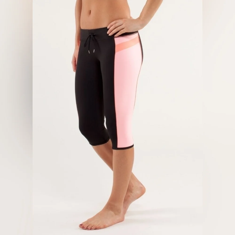 Lululemon Heat it Up Crop Orange Pop Black Coral Pop Orange Size 8 Rare